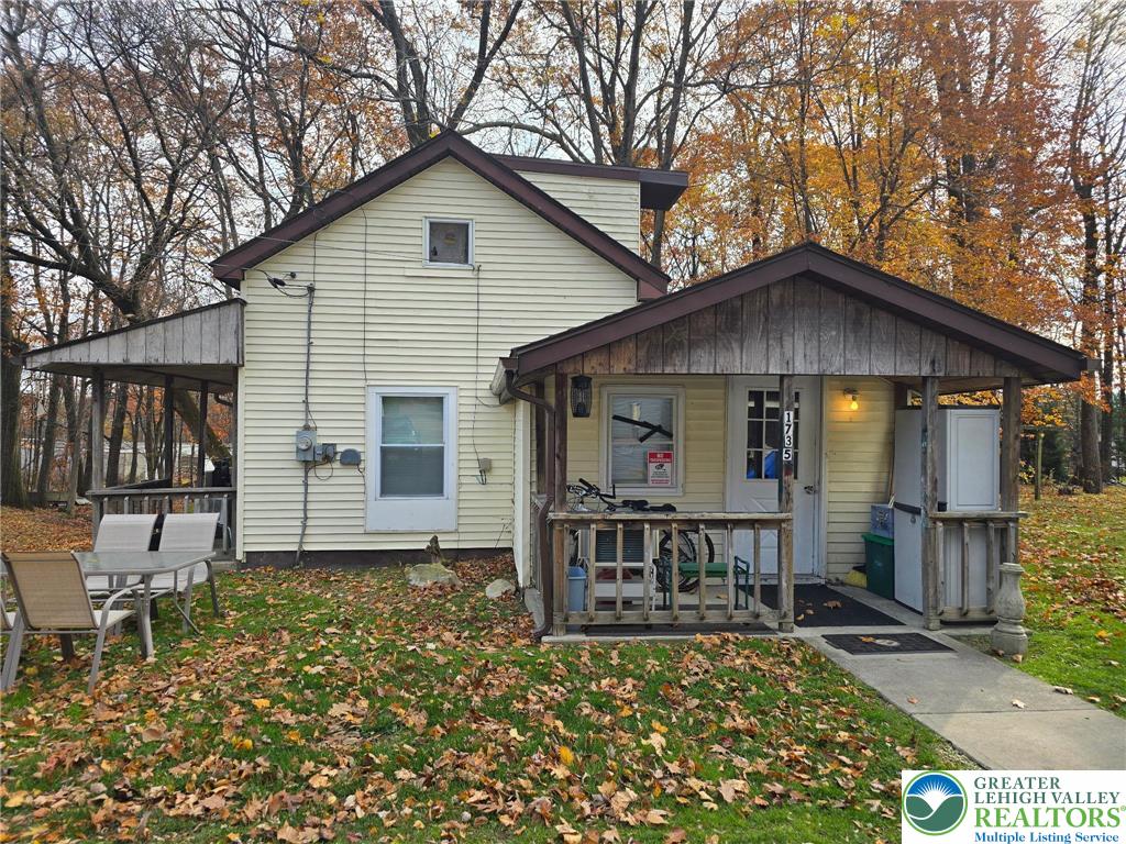 1731 West 8th Street Wind Gap, PA 18091 - Photo 2 of 13 a front view of a house with garden