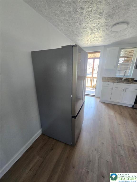 1731 West 8th Street Wind Gap, PA 18091 - Photo 9 of 13 an empty room with wooden floor and windows