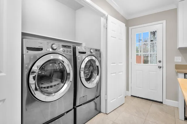 a utility room with dryer and washer