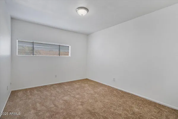 an empty room with a workbench