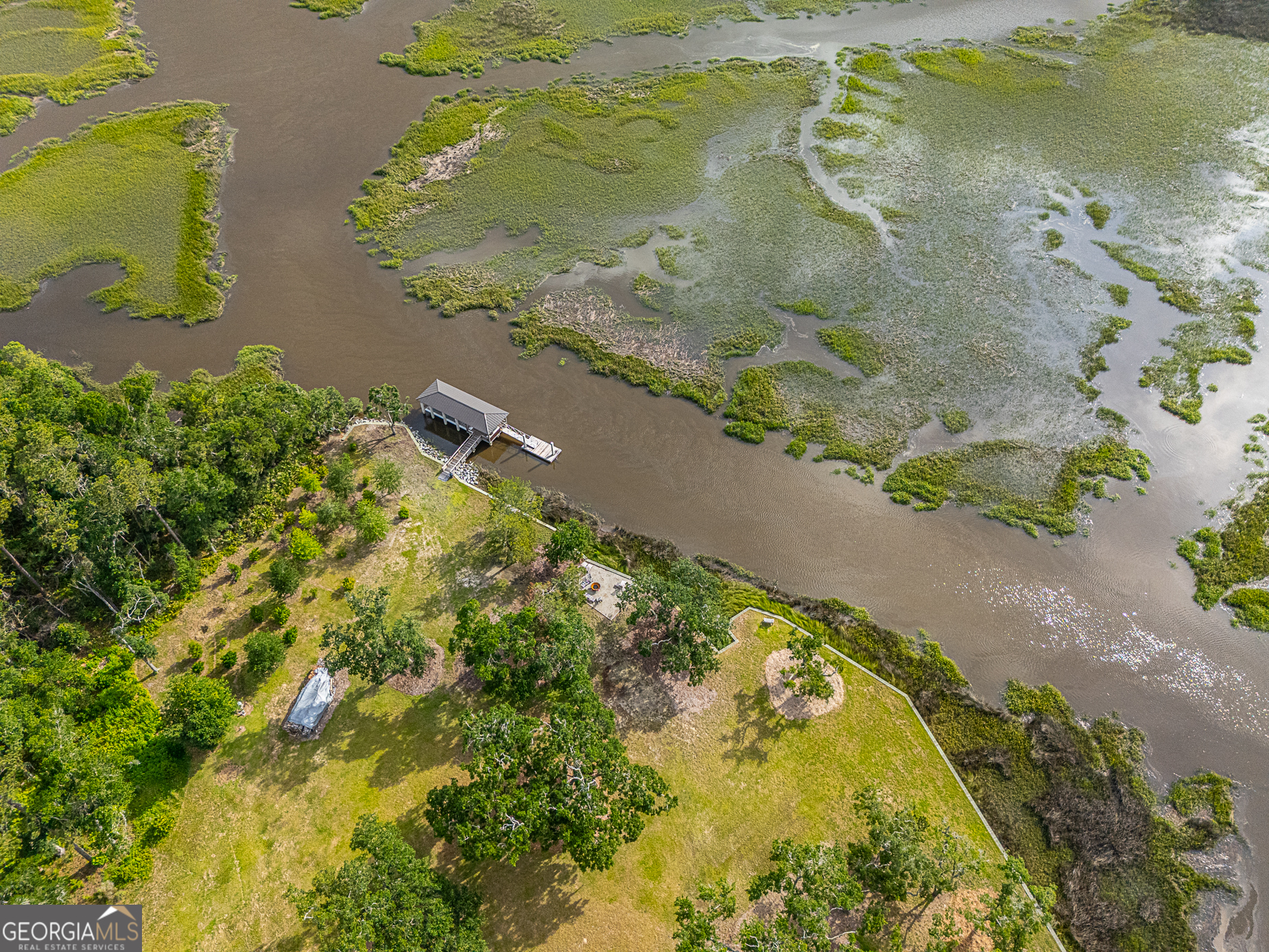 24 Carriage Drive St. Simons Island, GA 31522 - Photo 13 of 67 a view of a lake