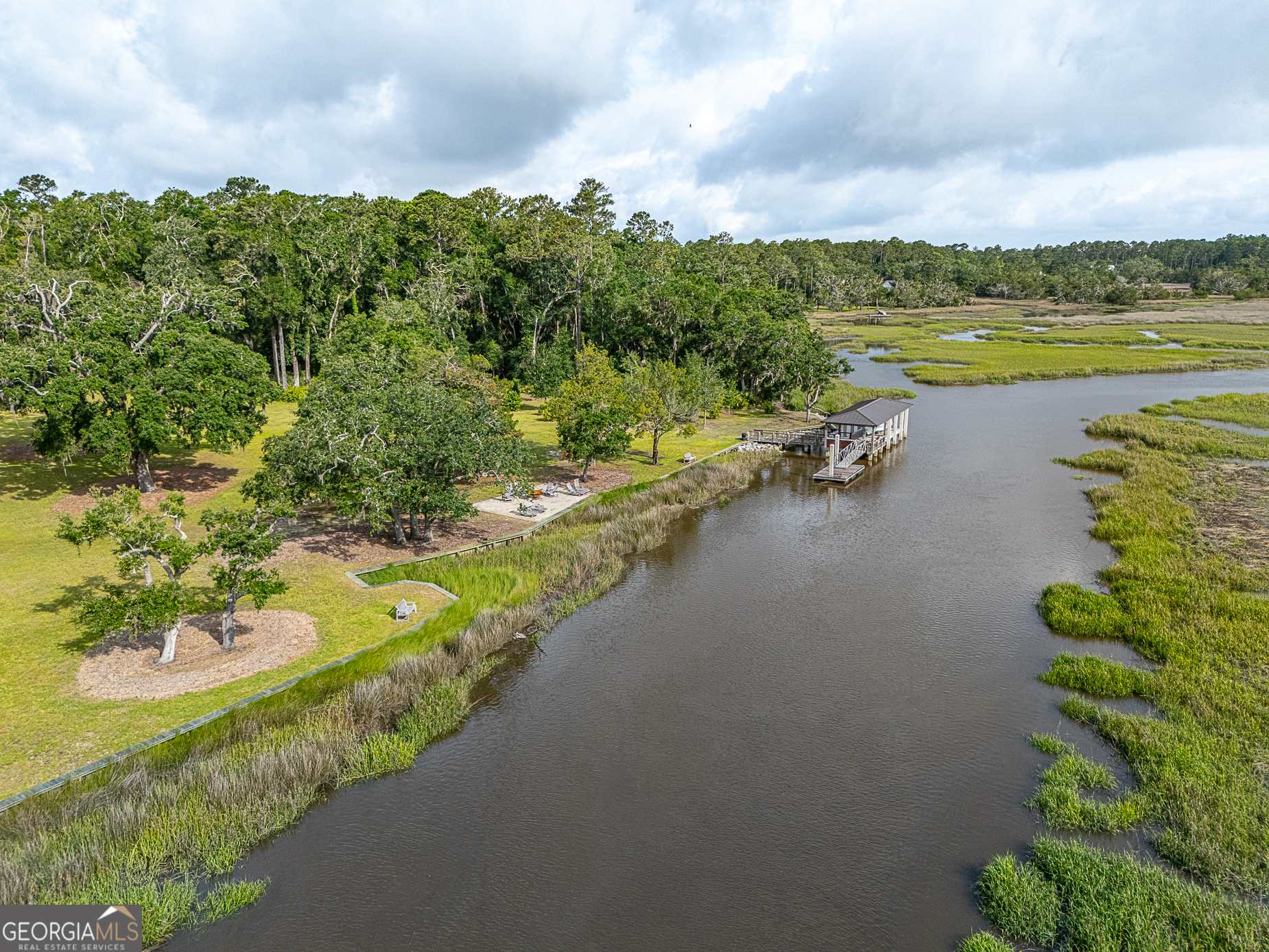 24 Carriage Drive St. Simons Island, GA 31522 - Photo 27 of 67 a view of a lake with a mountain