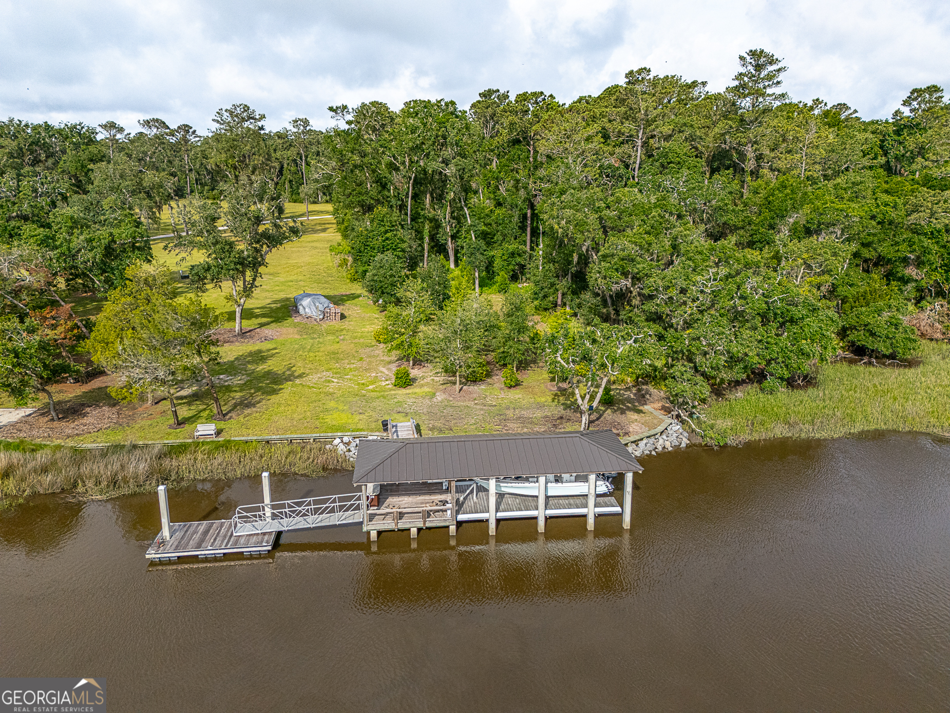 24 Carriage Drive St. Simons Island, GA 31522 - Photo 29 of 67 an aerial view of residential houses with outdoor space