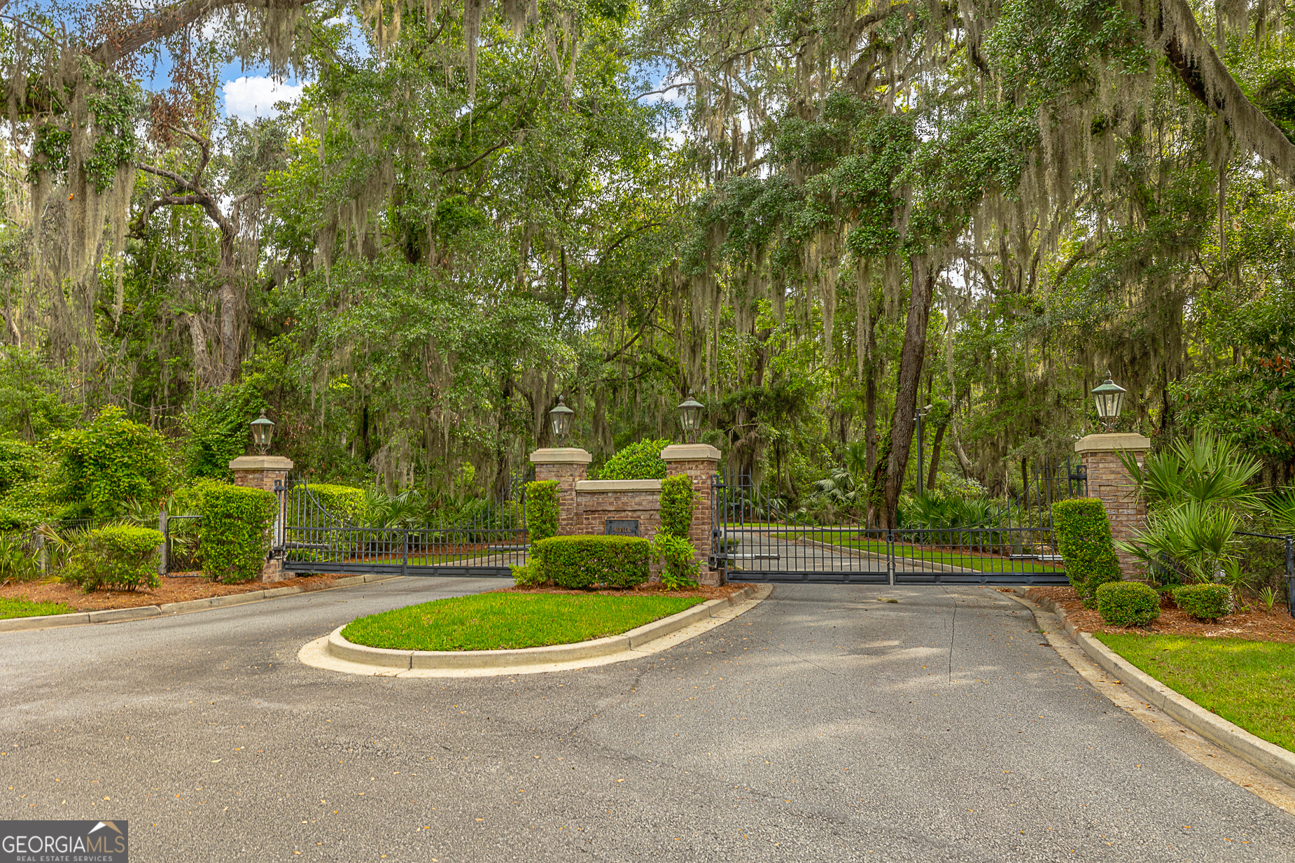 24 Carriage Drive St. Simons Island, GA 31522 - Photo 39 of 67 a view of a swimming pool with a patio