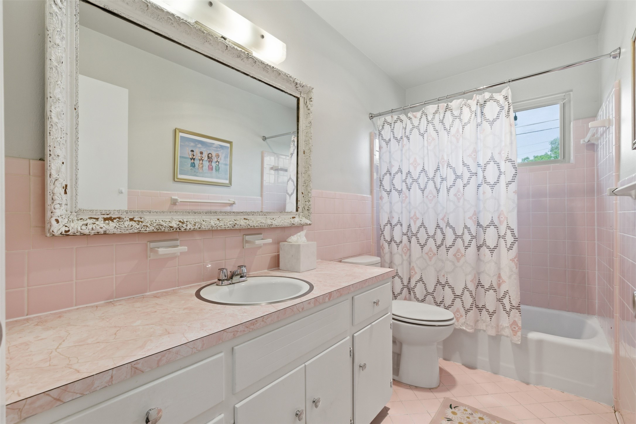 3208 Yellowpine Terrace Austin, TX 78757 - Photo 25 of 35 a bathroom with a granite countertop sink a toilet and a shower