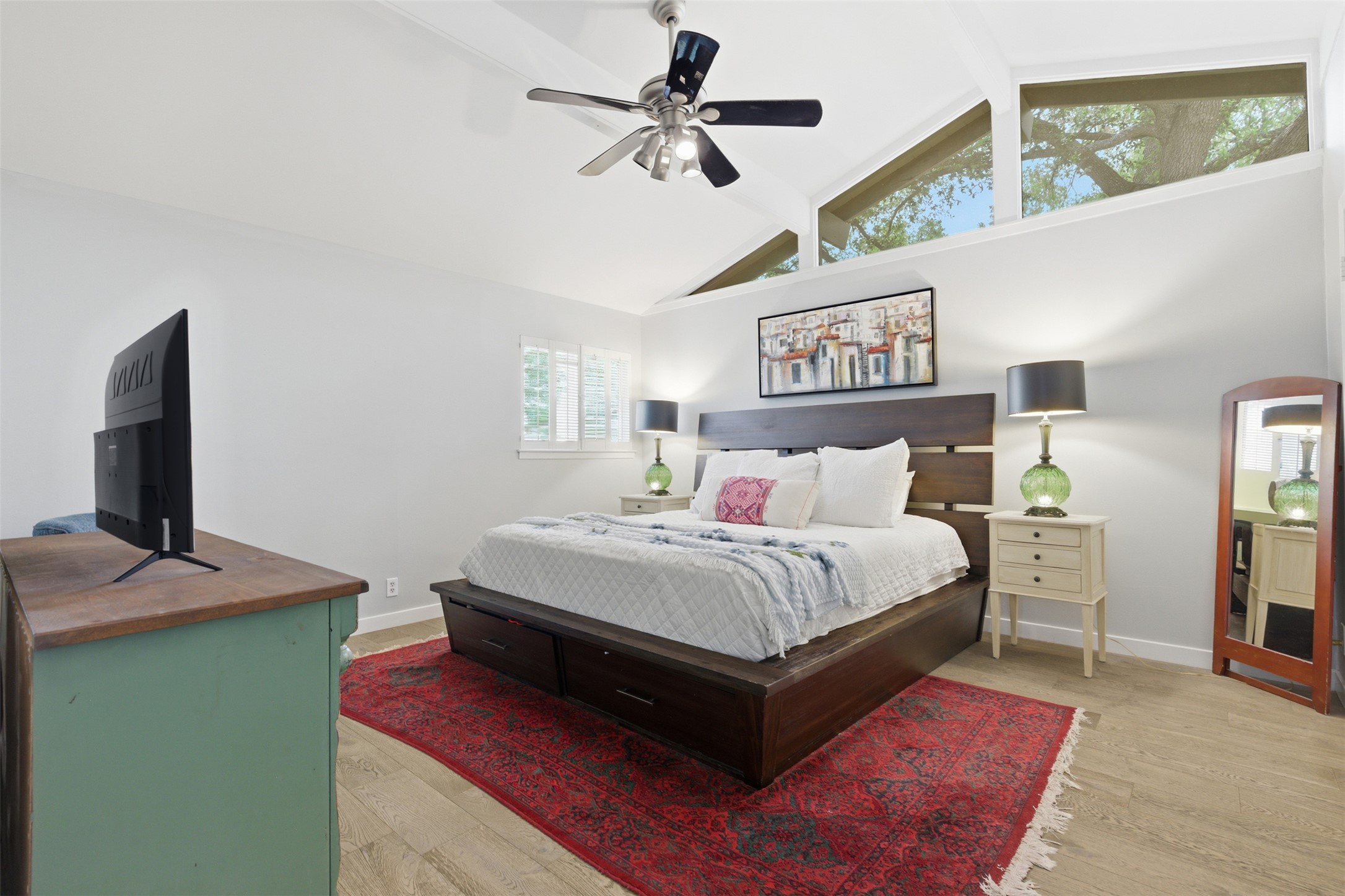 3208 Yellowpine Terrace Austin, TX 78757 - Photo 6 of 35 a bedroom with a bed and a flat screen tv