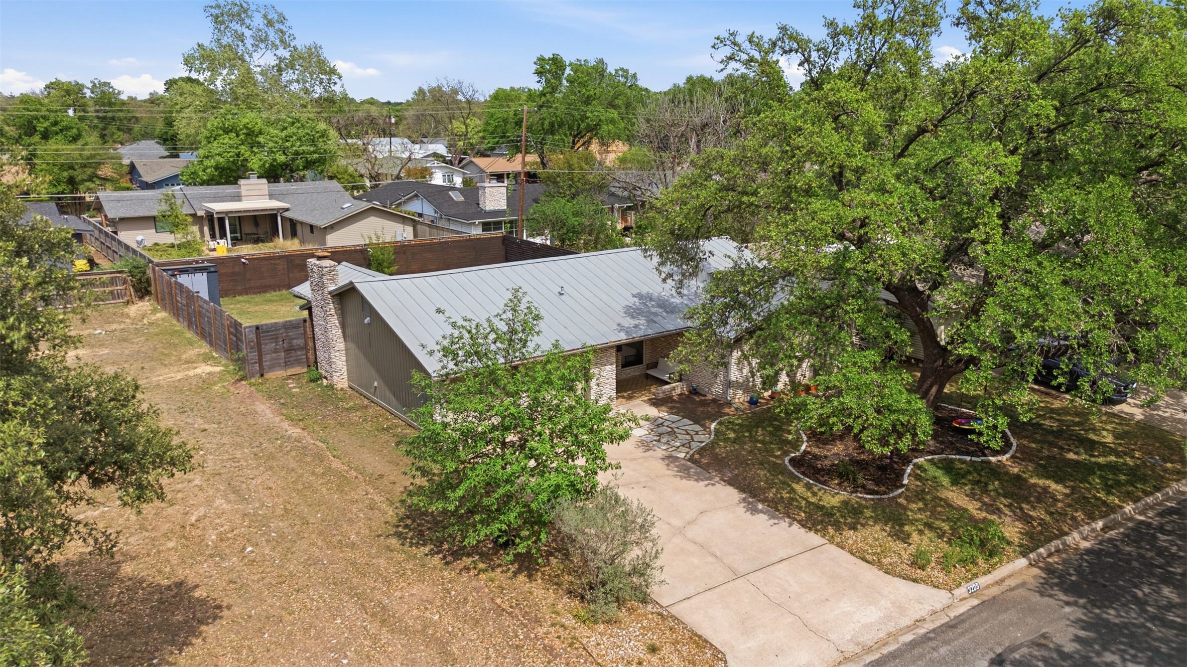 3208 Yellowpine Terrace Austin, TX 78757 - Photo 9 of 35 an aerial view of a house with a yard