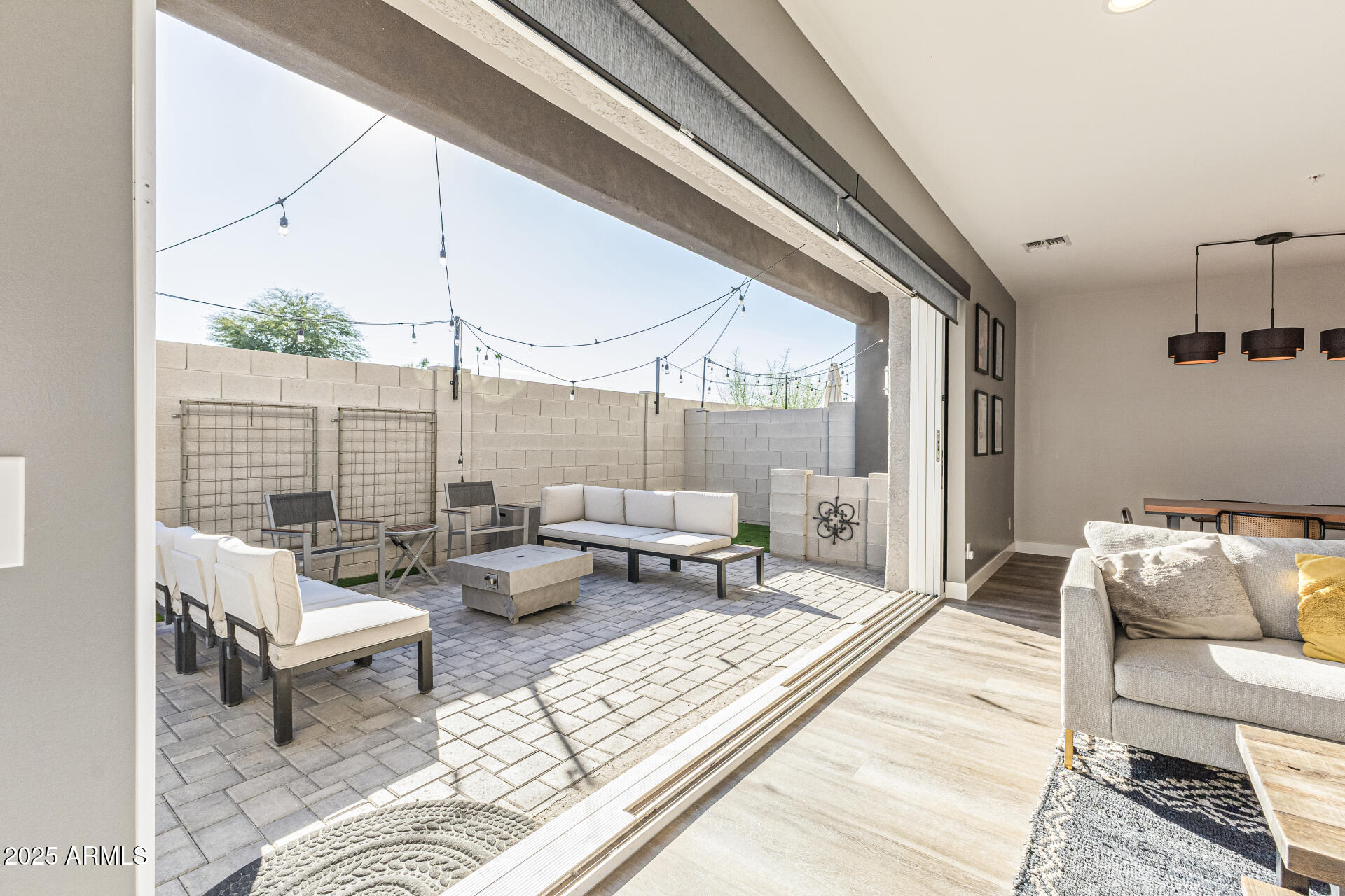 2315 East Pinchot Avenue, Unit 113 Phoenix, AZ 85016 - Photo 17 of 54 a living room with furniture and a large window