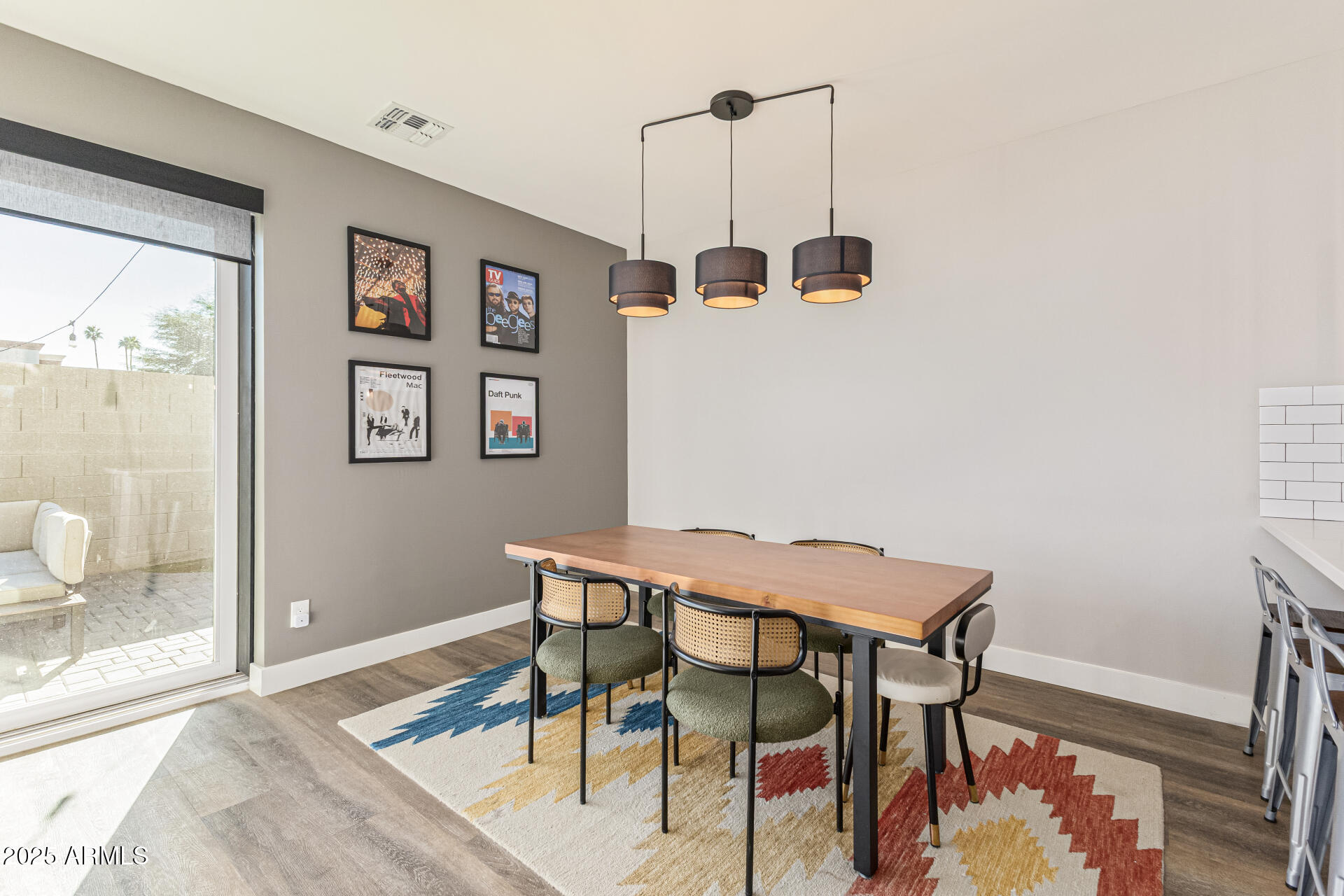 2315 East Pinchot Avenue, Unit 113 Phoenix, AZ 85016 - Photo 18 of 54 a view of a dining room with a table and chairs