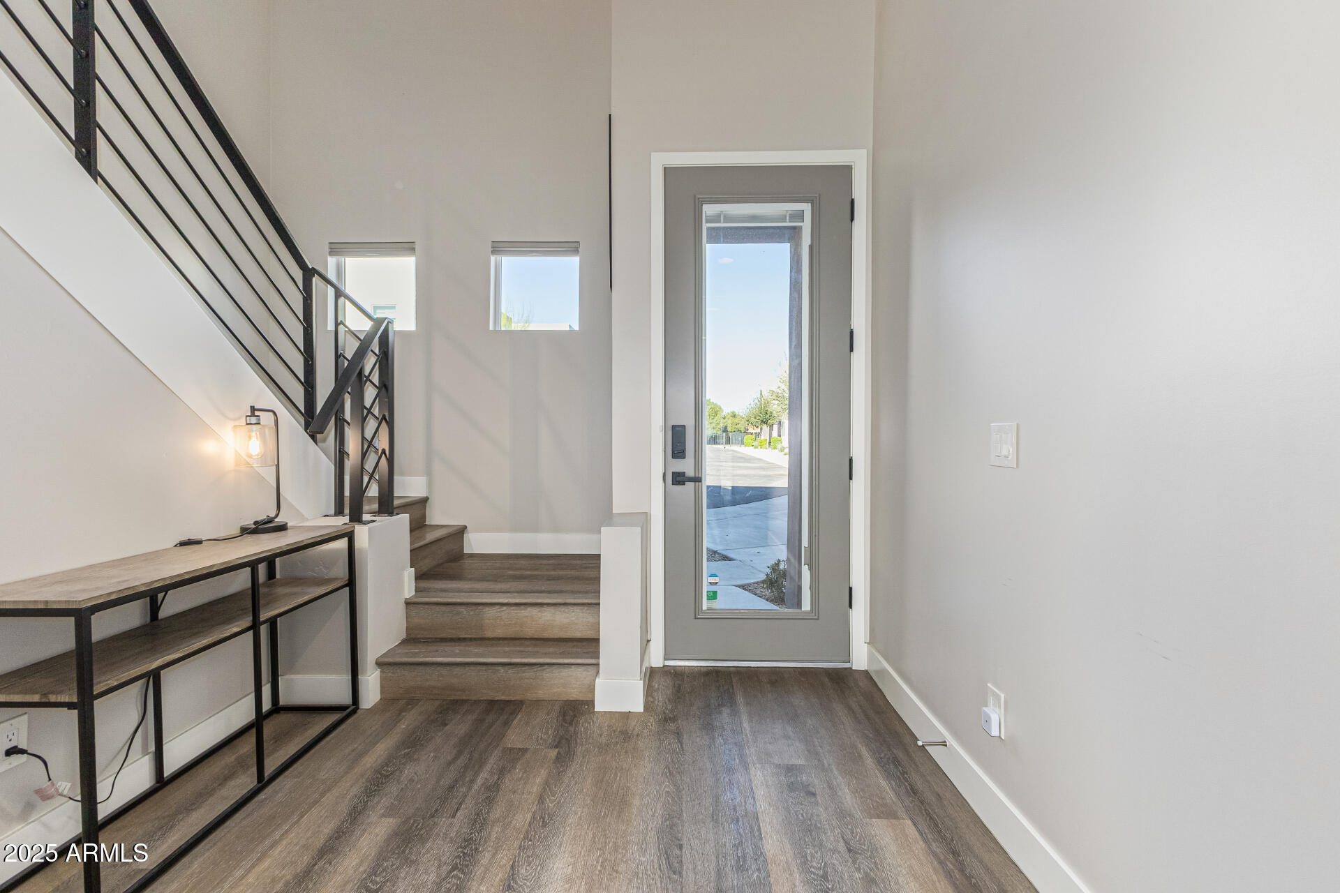 2315 East Pinchot Avenue, Unit 113 Phoenix, AZ 85016 - Photo 2 of 54 a view of entryway and hall with wooden floor