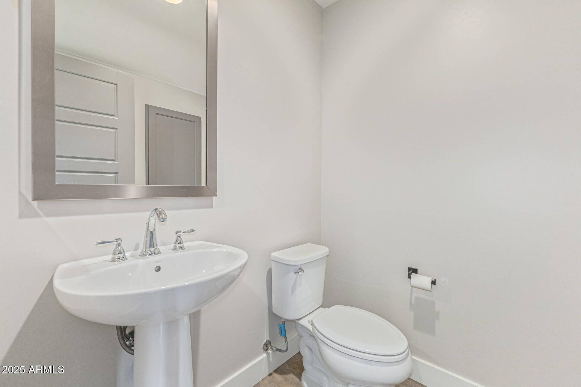 2315 East Pinchot Avenue, Unit 113 Phoenix, AZ 85016 - Photo 23 of 54 a bathroom with a sink a toilet and mirror