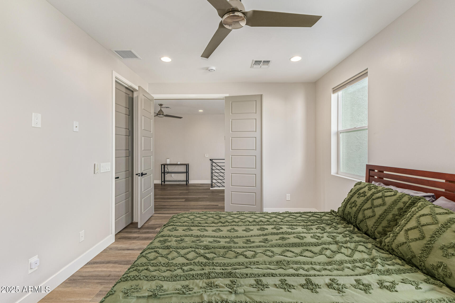 2315 East Pinchot Avenue, Unit 113 Phoenix, AZ 85016 - Photo 27 of 54 a bedroom with a bed and a window