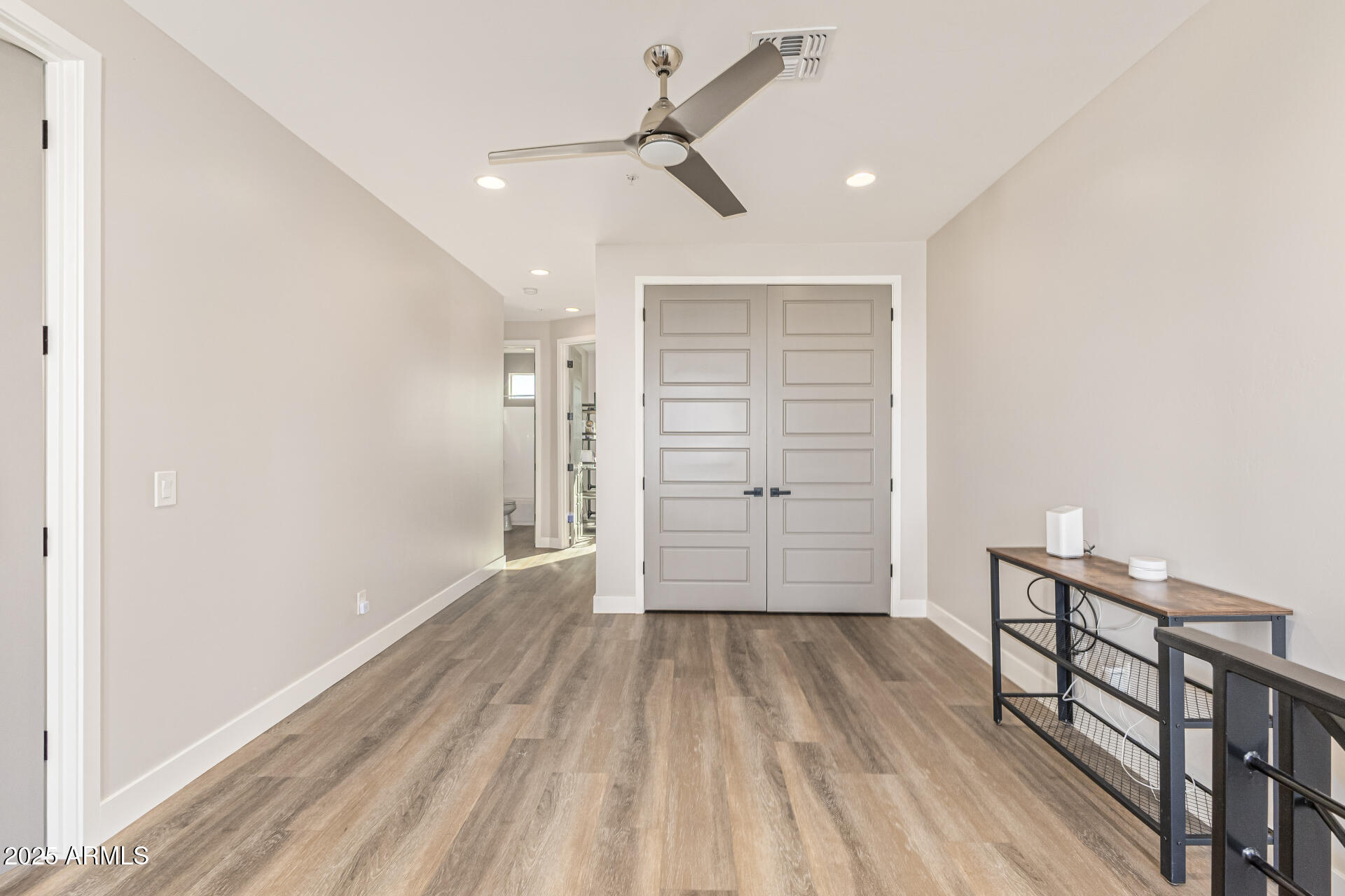2315 East Pinchot Avenue, Unit 113 Phoenix, AZ 85016 - Photo 34 of 54 a view of empty room with wooden floor