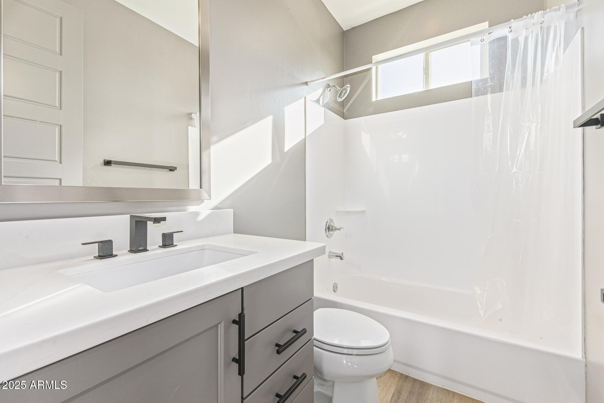 2315 East Pinchot Avenue, Unit 113 Phoenix, AZ 85016 - Photo 37 of 54 a bathroom with a sink a toilet and a bathtub