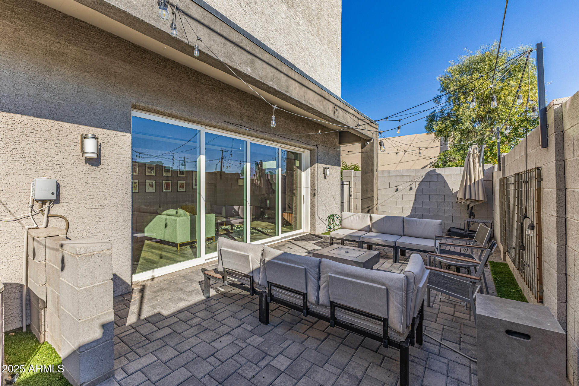 2315 East Pinchot Avenue, Unit 113 Phoenix, AZ 85016 - Photo 43 of 54 a roof deck with table and chairs and potted plants