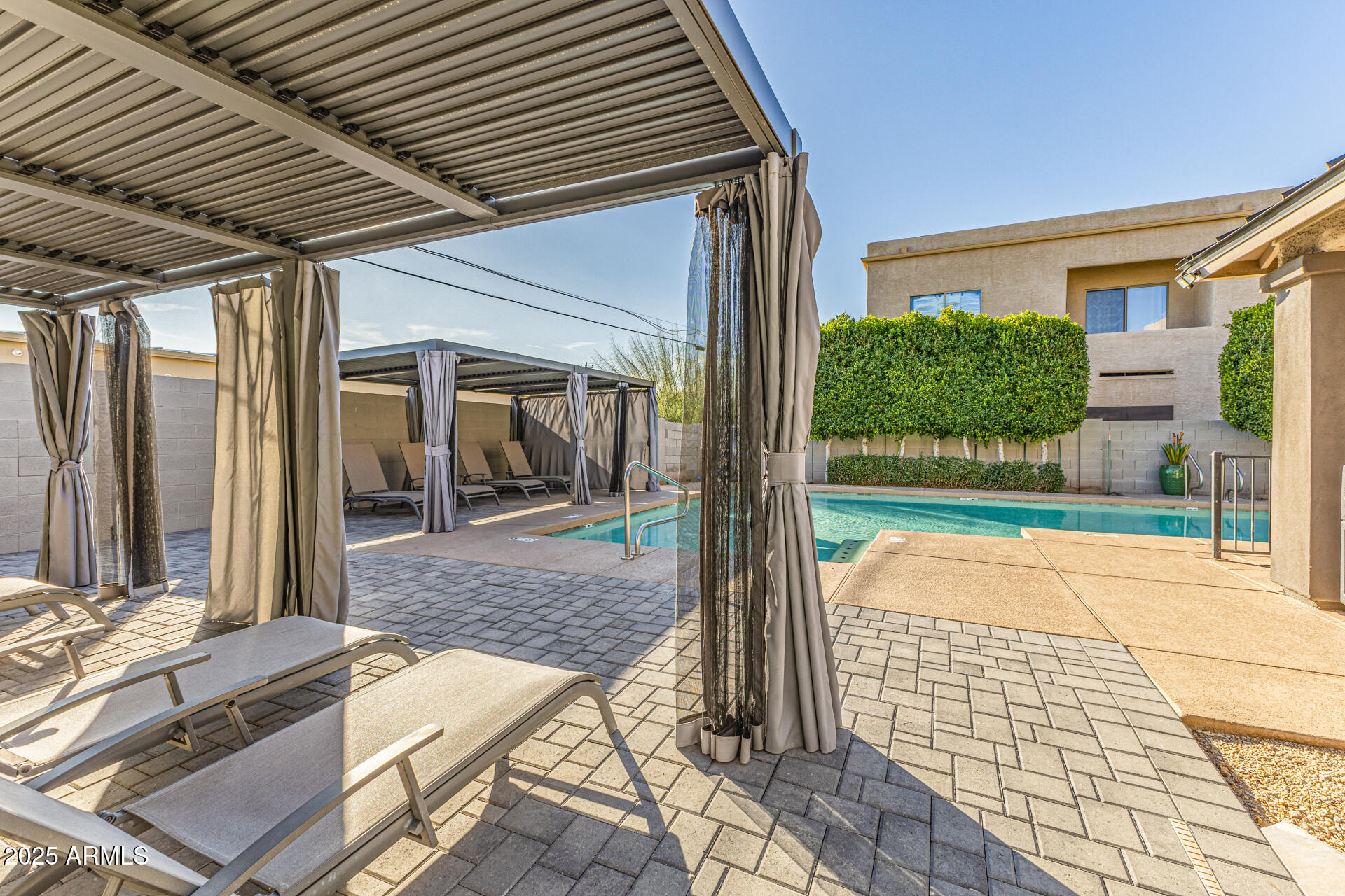 2315 East Pinchot Avenue, Unit 113 Phoenix, AZ 85016 - Photo 45 of 54 a view of a porch with a bench