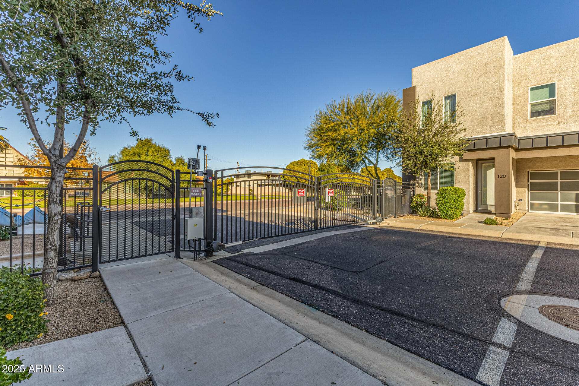 2315 East Pinchot Avenue, Unit 113 Phoenix, AZ 85016 - Photo 6 of 54 a view of a building with a bench