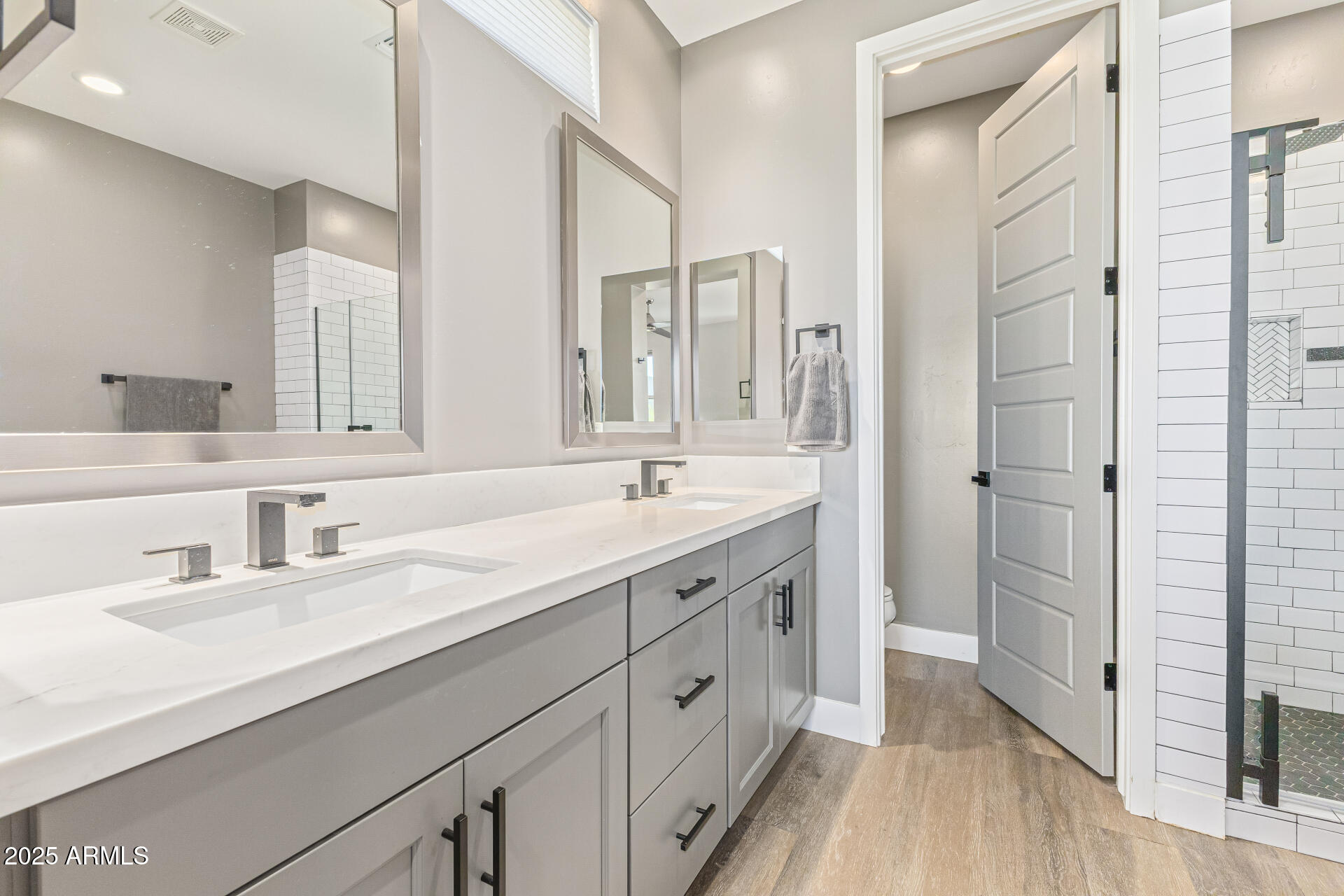 2315 East Pinchot Avenue, Unit 113 Phoenix, AZ 85016 - Photo 8 of 54 a spacious bathroom with a double vanity sink and a mirror