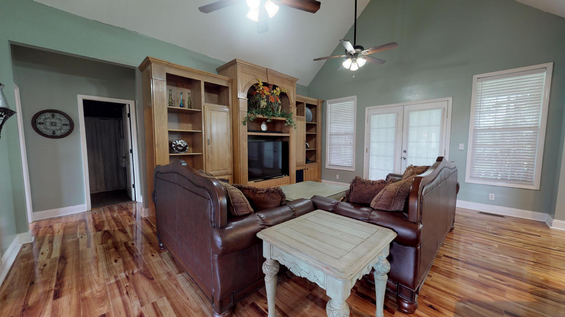 1489 Newman Road Prospect, TN 38477 - Photo 8 of 23 a living room with furniture and a fireplace