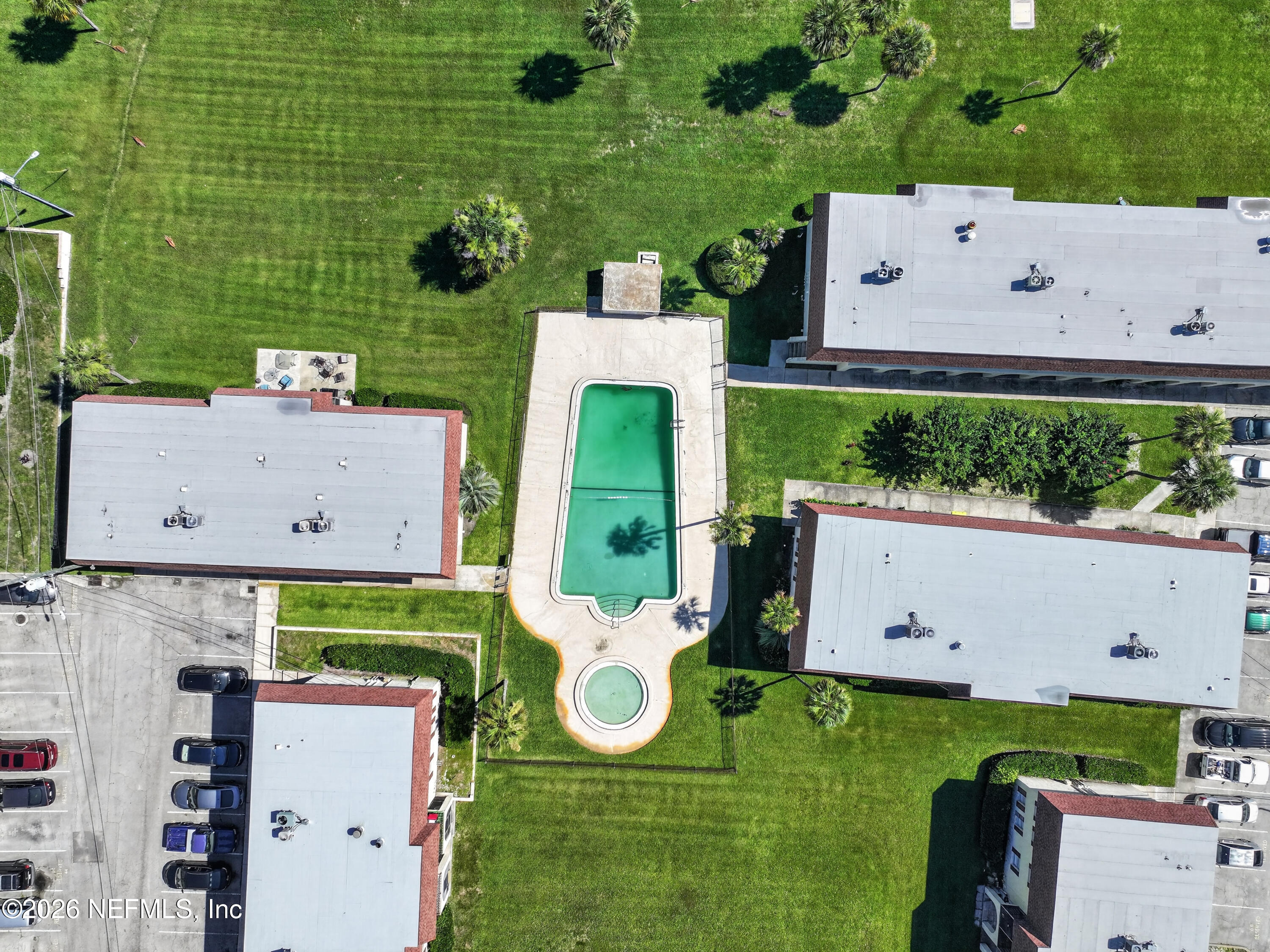 7346 El Barco Road, Unit 4 Jacksonville, FL 32216 - Photo 19 of 19 an aerial view of a house with a swimming pool