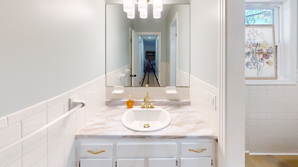 506 Lankford Road Paris, TN 38242 - Photo 13 of 23 a bathroom with a sink and a mirror