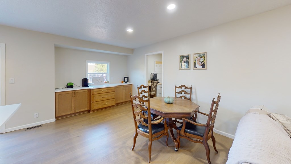 506 Lankford Road Paris, TN 38242 - Photo 17 of 23 a view of a dining room with furniture and wooden floor