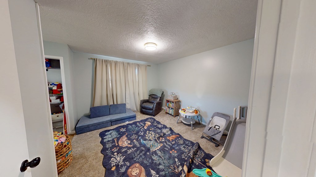 506 Lankford Road Paris, TN 38242 - Photo 2 of 23 a bedroom with furniture and a window