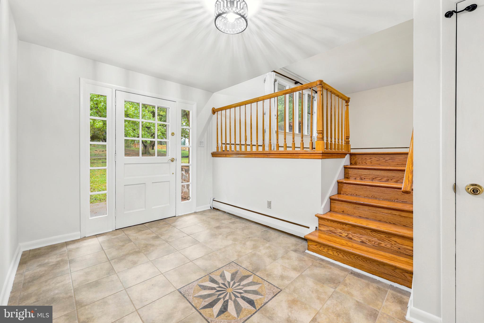 412 Yorkshire Road Bryn Mawr, PA 19010 - Photo 3 of 25 a view of an entryway with staircase