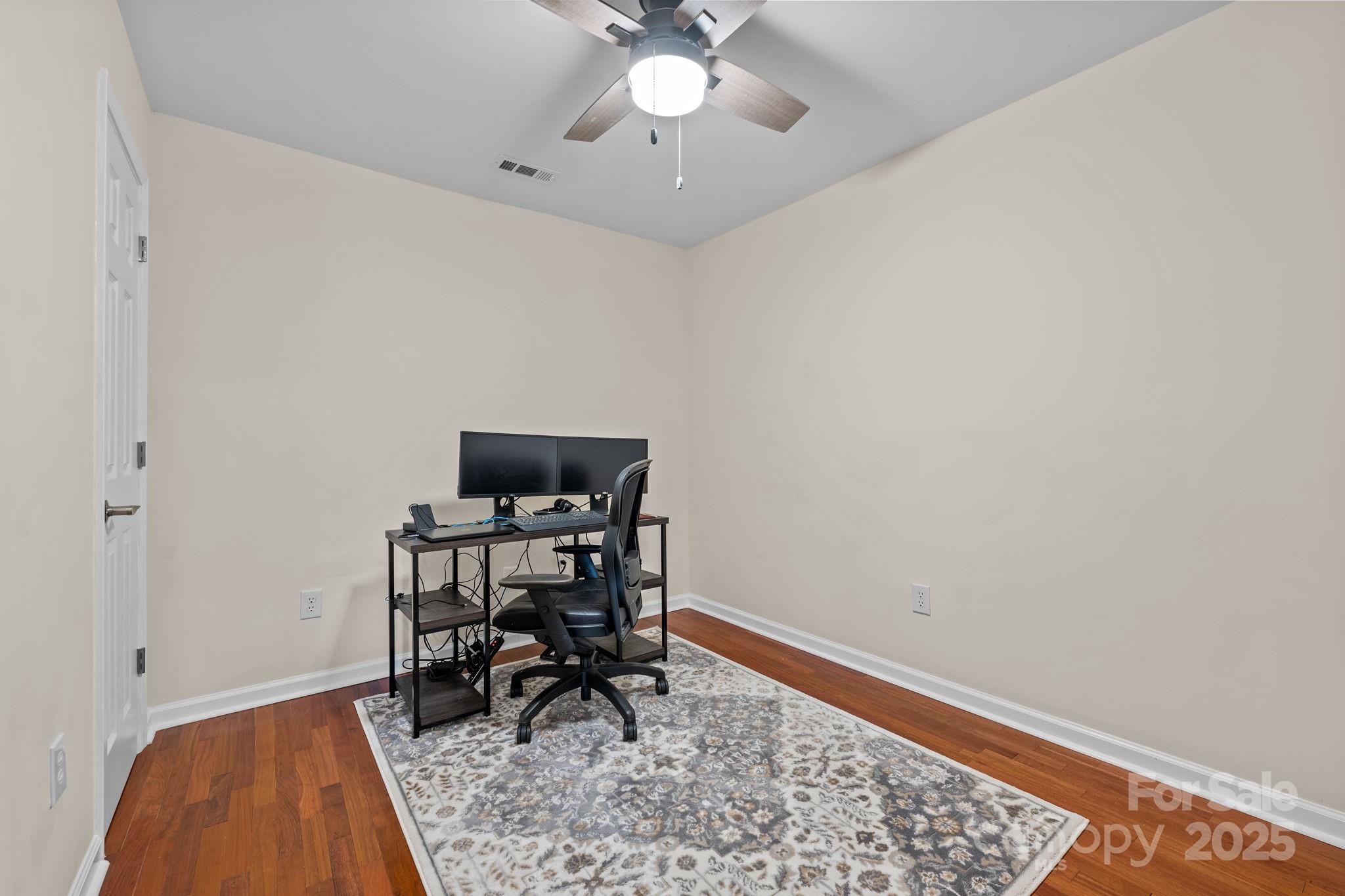2337 Belmont Road Linwood, NC 27299 - Photo 14 of 46 a workspace with furniture and rug