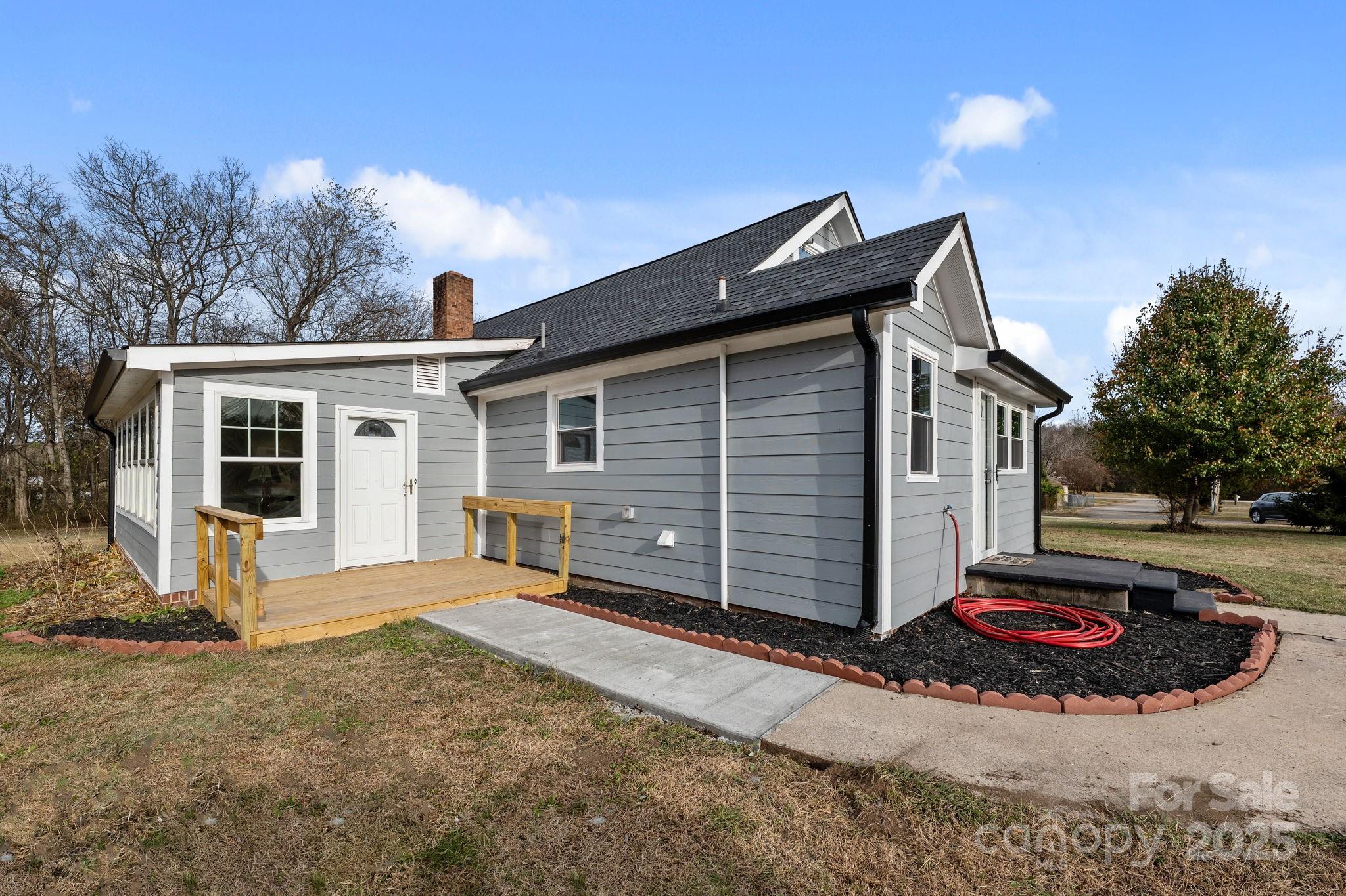 2337 Belmont Road Linwood, NC 27299 - Photo 35 of 46 a front view of a house with yard