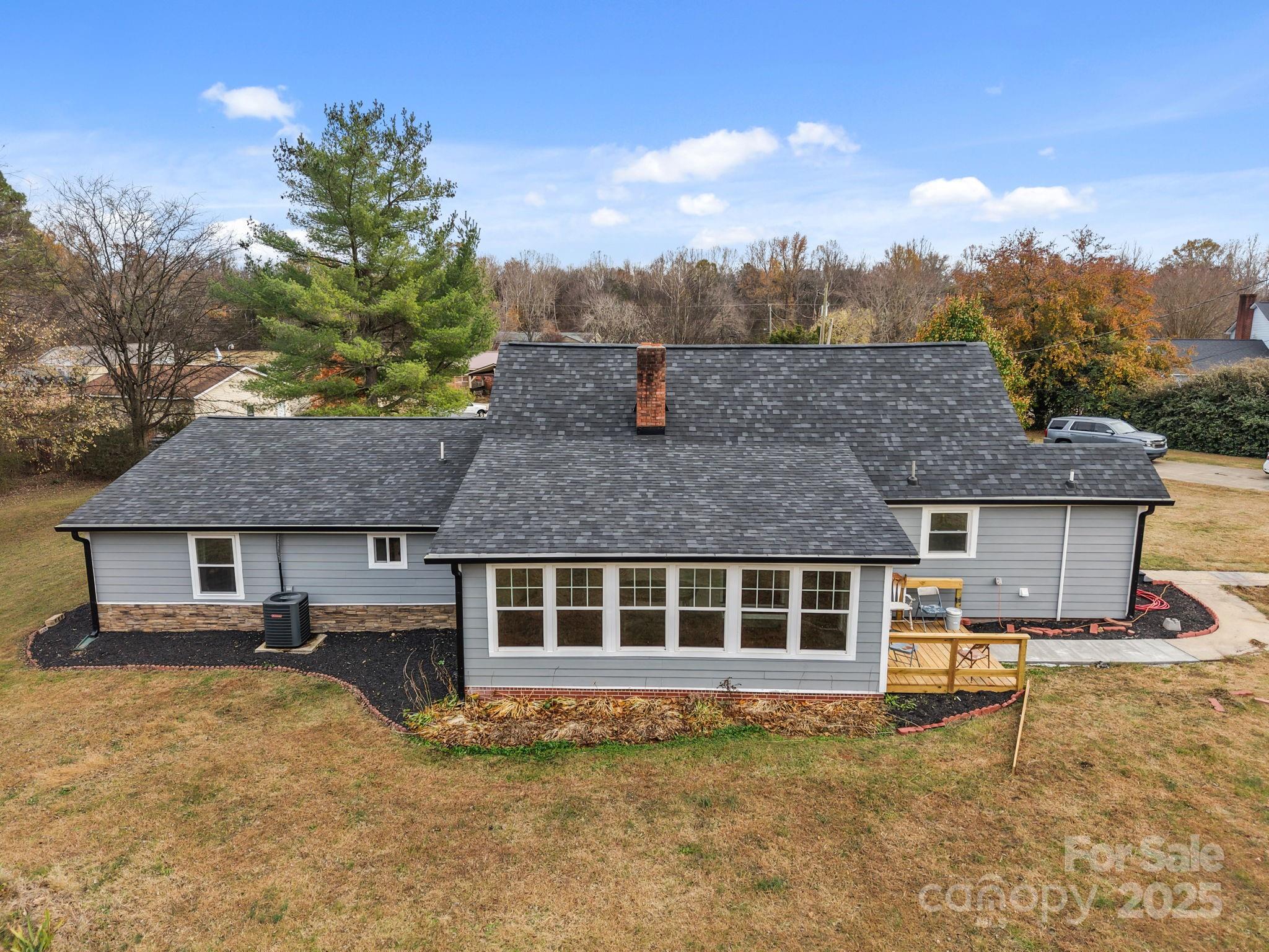 2337 Belmont Road Linwood, NC 27299 - Photo 39 of 46 a front view of a house with a yard