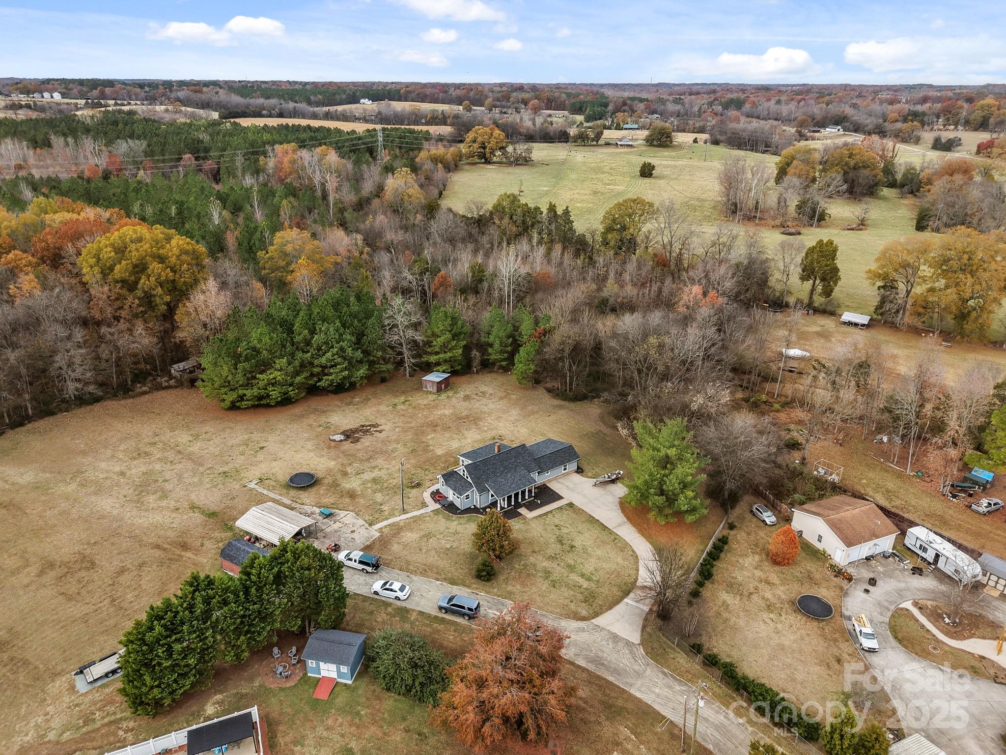 2337 Belmont Road Linwood, NC 27299 - Photo 42 of 46 a view of a lake with mountains in the background