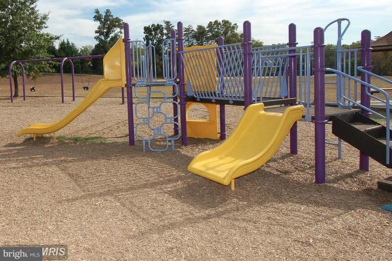 693 Winding Stream Way, Unit 201 Odenton, MD 21113 - Photo 26 of 28 a view of a park with slide