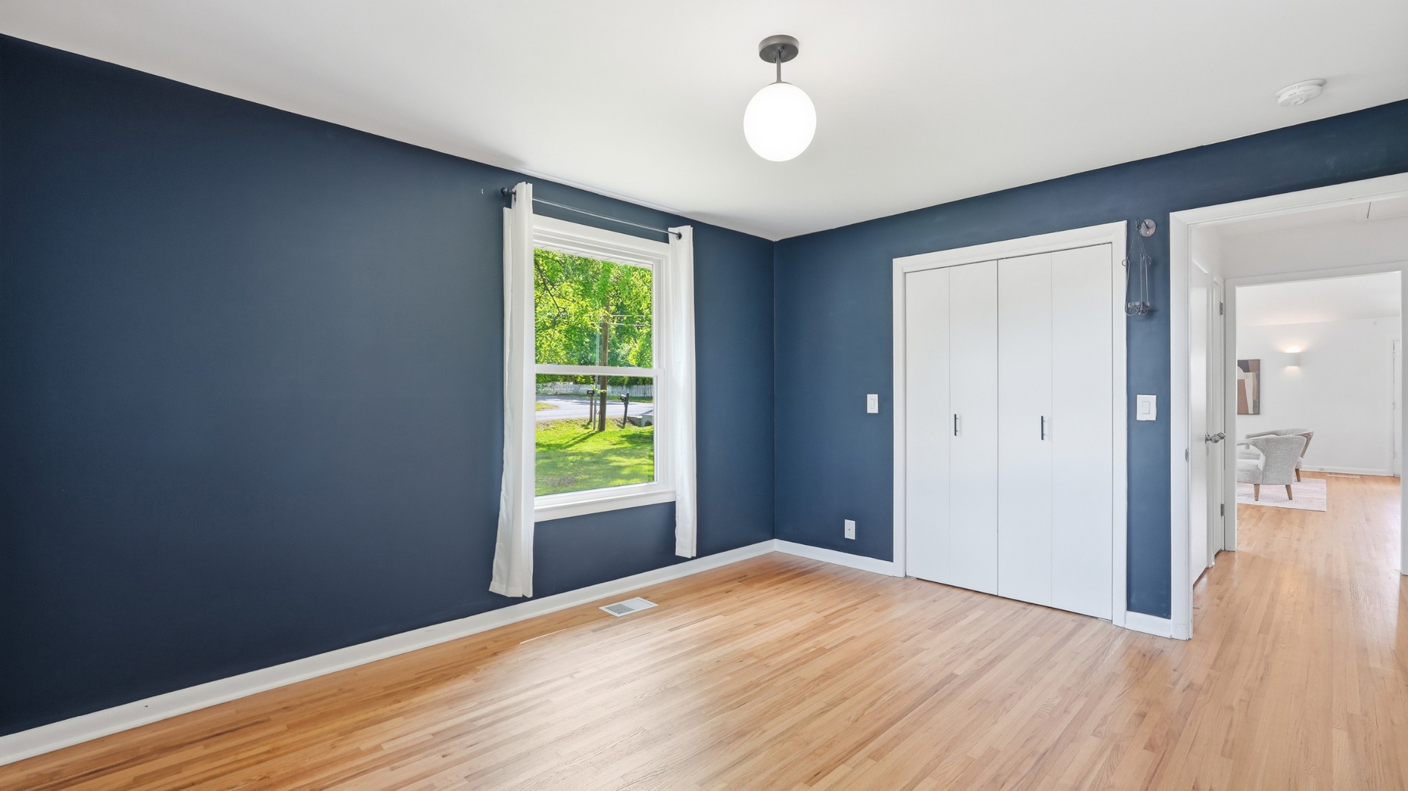 2101 Porter Road Nashville, TN 37216 - Photo 31 of 48 a view of empty room with wooden floor and fan