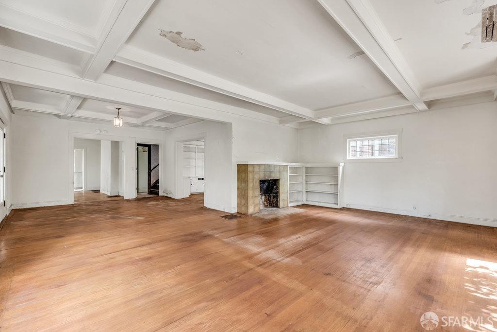 2815 Ashby Avenue Berkeley, CA 94705 - Photo 11 of 57 a view of an empty room with window and fireplace