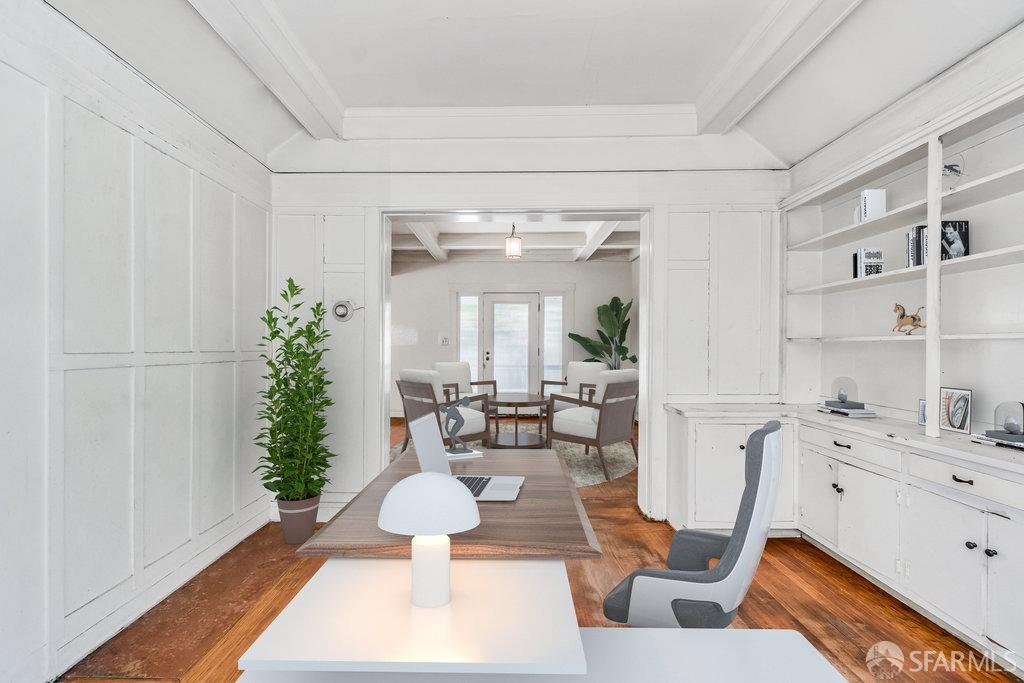 2815 Ashby Avenue Berkeley, CA 94705 - Photo 14 of 57 a living room with furniture and a potted plant