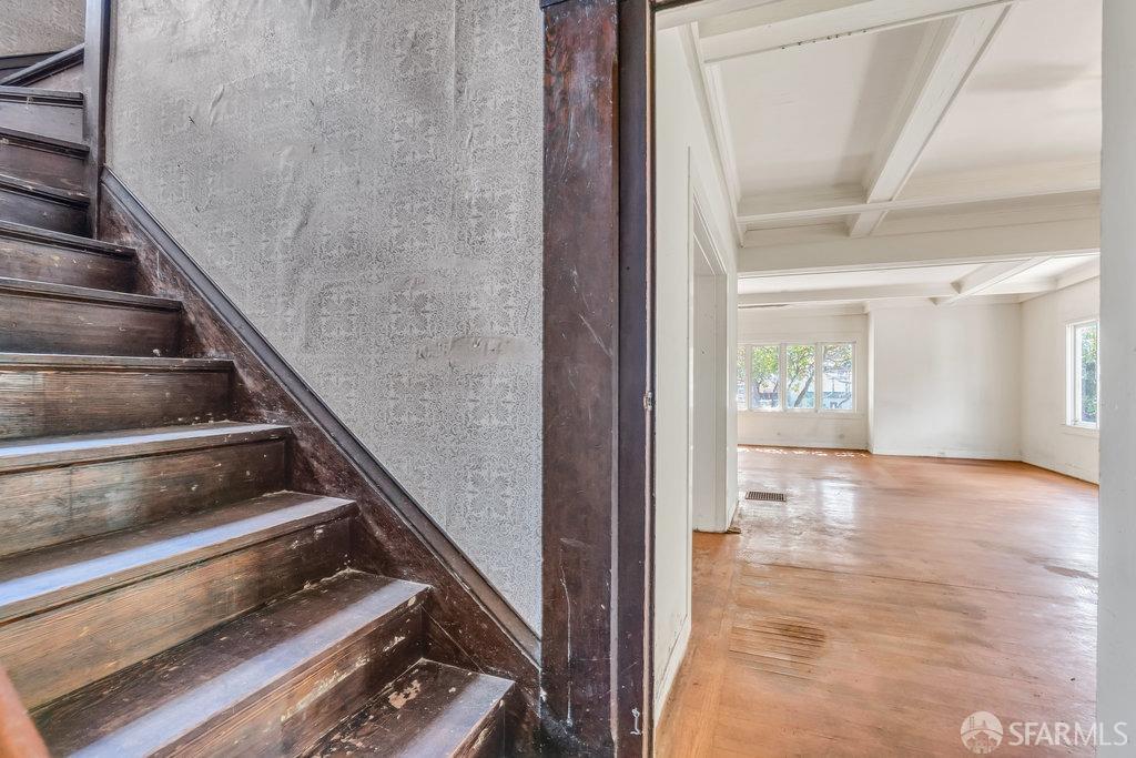 2815 Ashby Avenue Berkeley, CA 94705 - Photo 23 of 57 a view of an empty room and wooden floor
