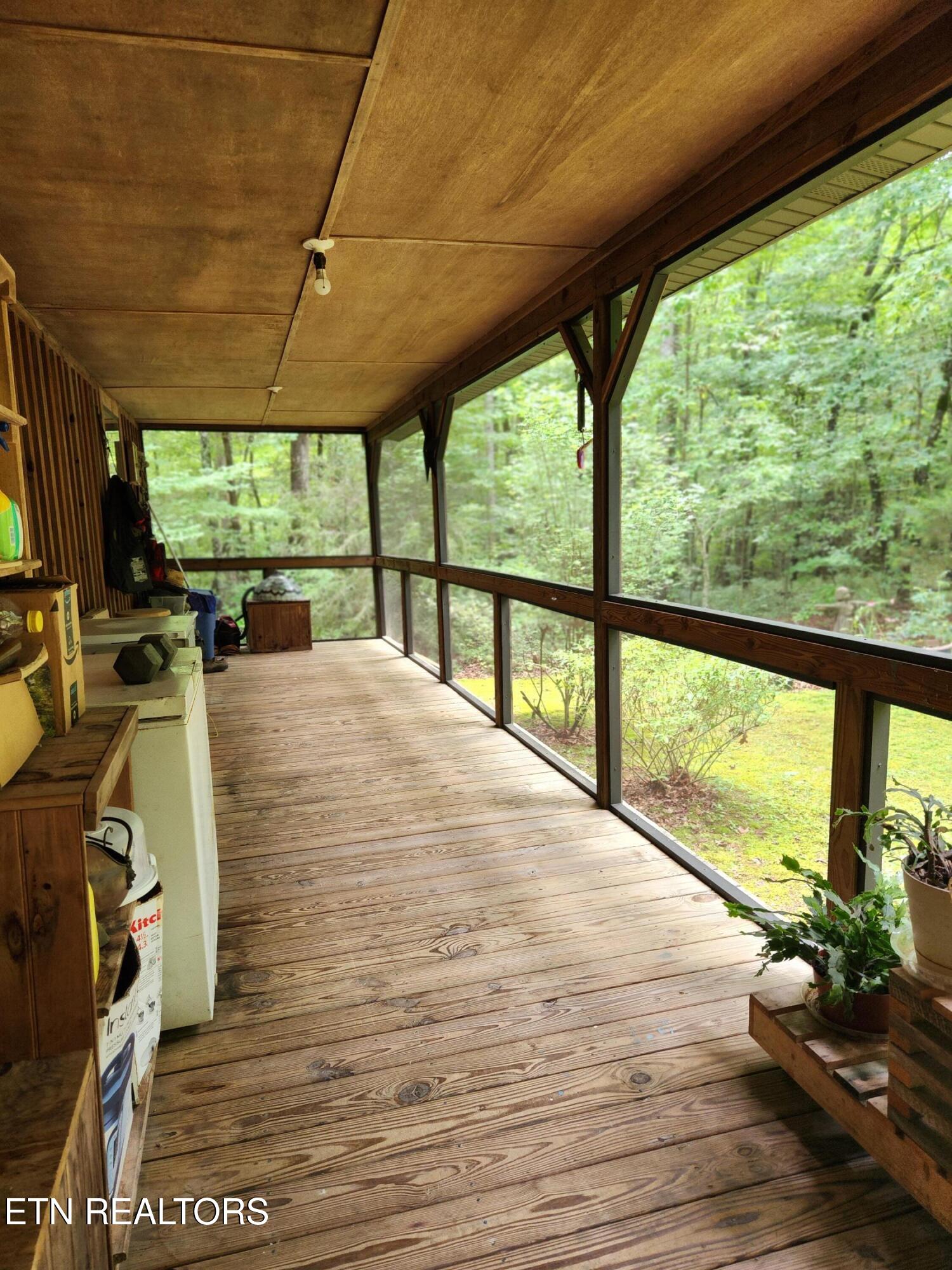 108 Gold Miners Road Tellico Plains, TN 37385 - Photo 12 of 35 Screened porch