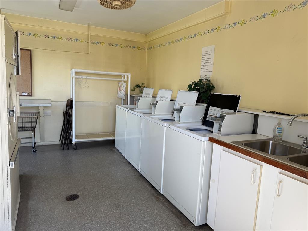 231 Inner Drive East Venice, FL 34285 - Photo 8 of 13 a utility room with dryer and washer