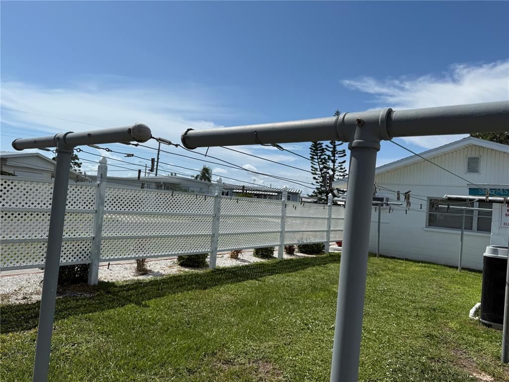 231 Inner Drive East Venice, FL 34285 - Photo 9 of 13 a view of a backyard with hardwood