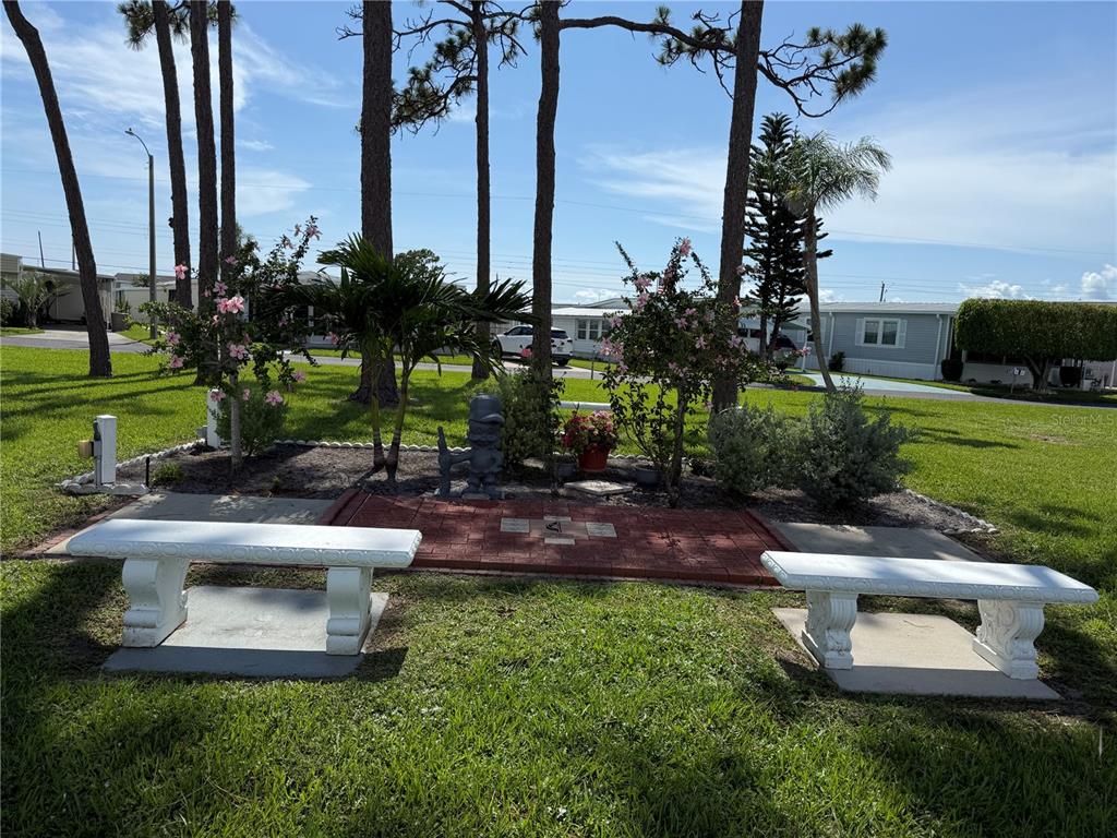231 Inner Drive East Venice, FL 34285 - Photo 10 of 13 a view of a backyard with sitting area and entertaining space