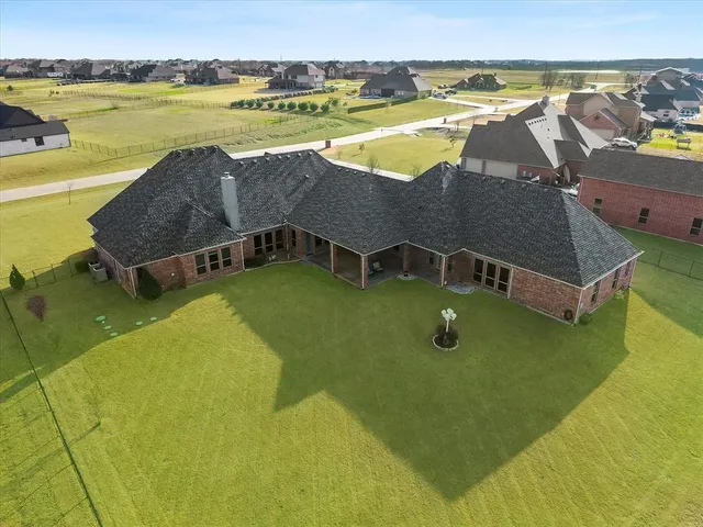 a view of a swimming pool with lounge chair