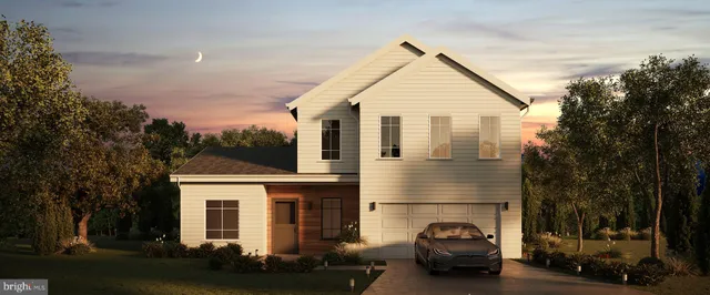 a car parked in front of a white house