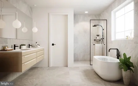 a bathroom with a bathtub sink and mirror