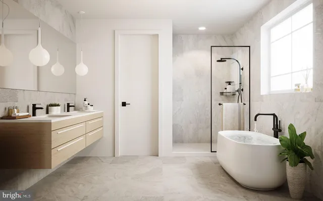 a bathroom with a bathtub sink and mirror