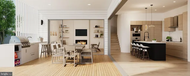 a kitchen with stainless steel appliances a dining table chairs stove and refrigerator