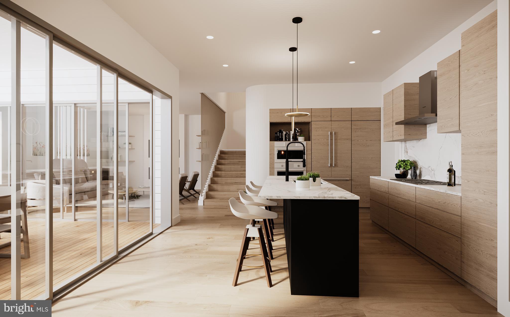 9-2 Walnut Ridge Road Wilmington, DE 19807 - Photo 8 of 13 a kitchen with stainless steel appliances kitchen island granite countertop a refrigerator a stove and a sink with wooden floor