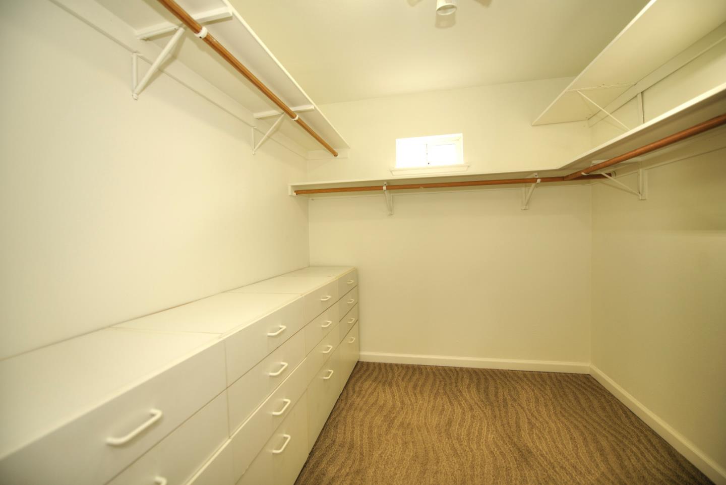 1396 Fallen Leaf Drive Milpitas, CA 95035 - Photo 22 of 43 a view of an empty walk in closet