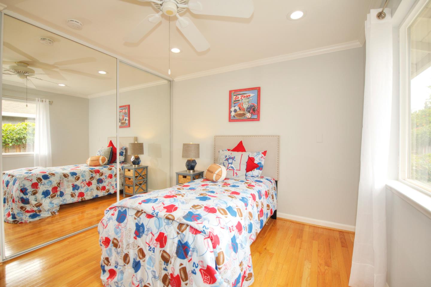 1396 Fallen Leaf Drive Milpitas, CA 95035 - Photo 26 of 43 a bedroom with a bed and a window