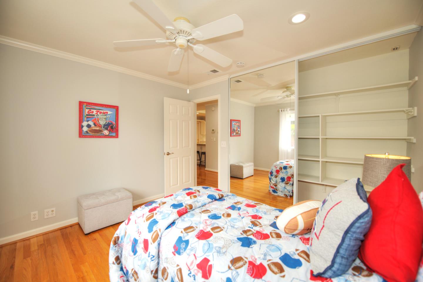 1396 Fallen Leaf Drive Milpitas, CA 95035 - Photo 27 of 43 a bedroom with a bed and a chandelier